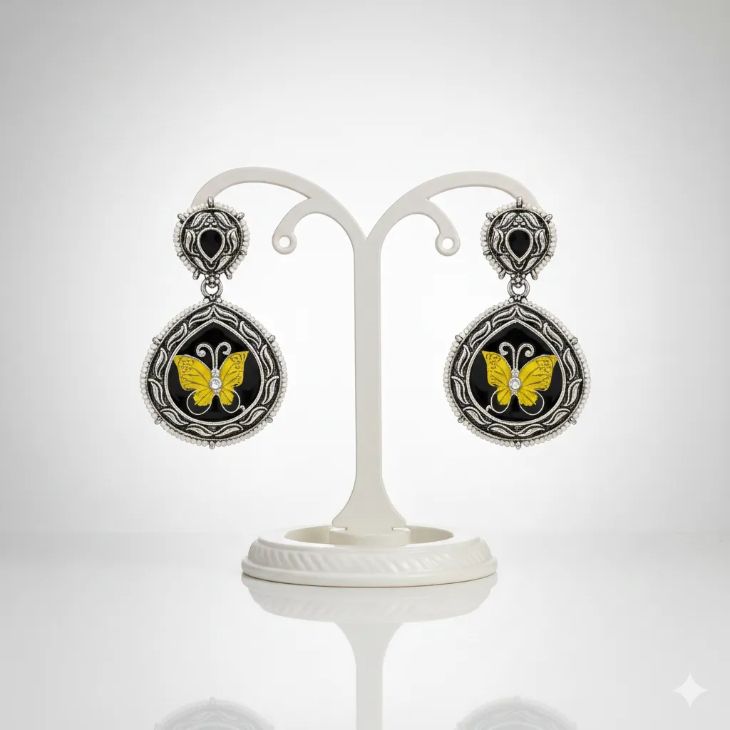 [0058] Trendy oxidised butterfly earrings in silver-tone finish