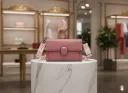 Women's Dusty Pink PU Sling Bag with Square Buckle Closure & Zigzag Pattern Strap